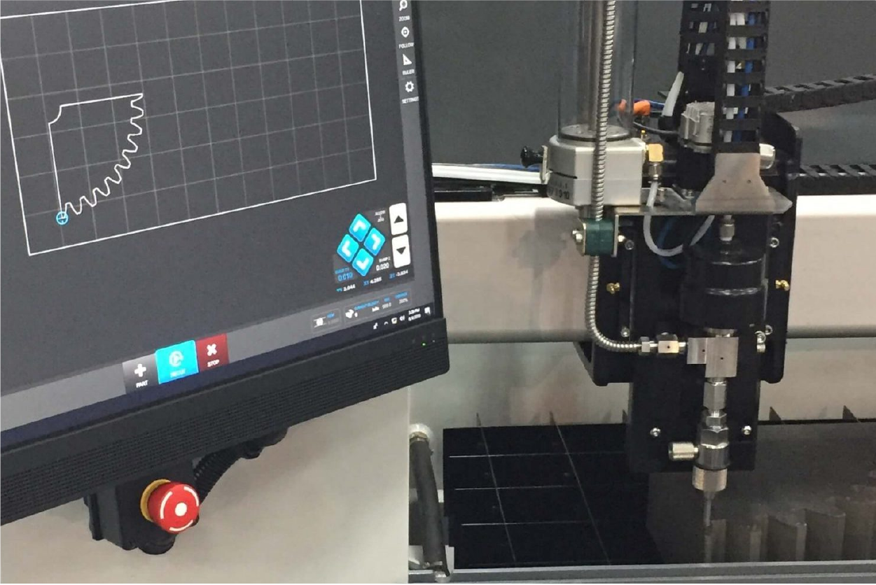 Waterjet Cutting - monitor and machine