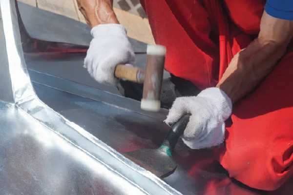 Hammering Malleable Metal